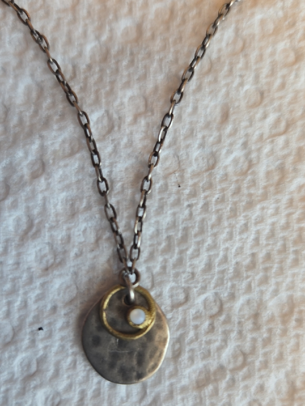Silpada N1671 Oxidized Hammered SS Disc w/brass Ring And Tiny River Shell